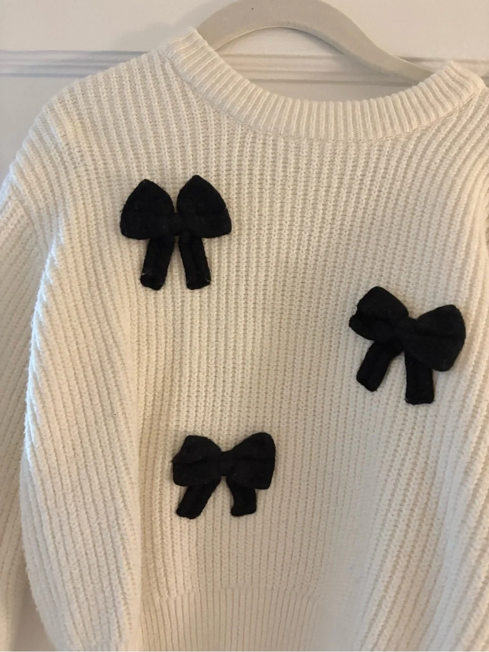 GAP White Crewneck Sweater with Black Bow Appliqués